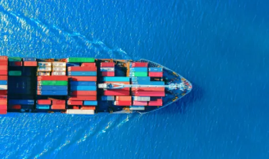 Aerial top view container ship full load container for logistics import export, shipping or transportation concept background.